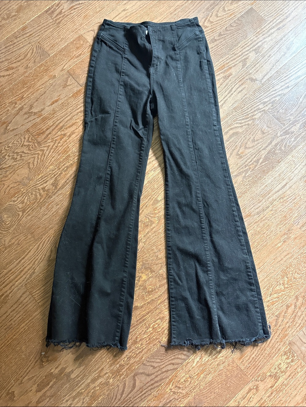 We The Free Black High-Rise Flared Jeans with Raw Hem